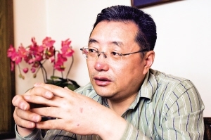 王功权：我是中国为数不多站着把钱挣了的人